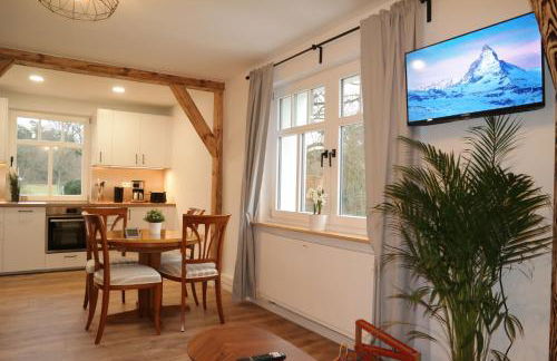 Modernes Ferienhaus mit 4 separaten Appartements, je mit vollausgestatteter Küchenzeile und eigenem Bad, 2 Gehminuten zum Badesee, Garten, Grillplatz, Kinderspielbereich, Hunde sind willkommen - Foto 13