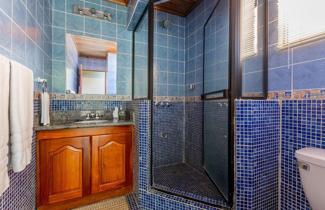 Beachfront Condo with Warm, Rustic Interiors & Direct Access to Playa Flamingo - Photo 13