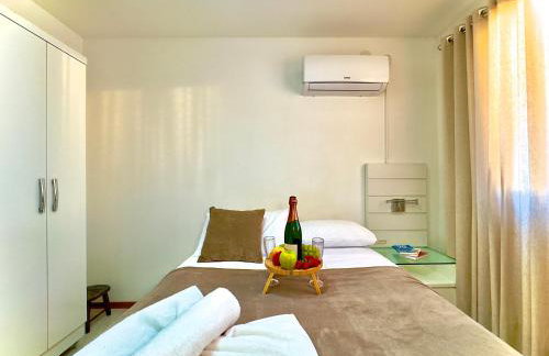 Apto em Barra Velha 340m da PRAIA com SACADA com CHURRASQUEIRA, AR CONDICIONADO WI-FI, PISCINA, PORTARIA 24h, ACADEMIA MINI MERCADO e vaga de GARAGEM - Photo 16