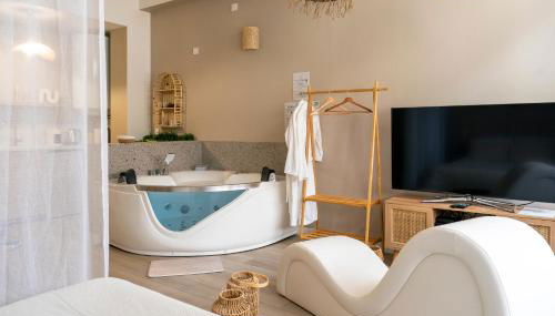 Suite sensuelle balnéothérapie et fauteuil tantra - Foto 2