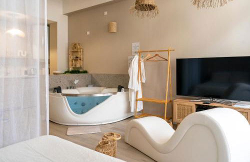 Suite sensuelle balnéothérapie et fauteuil tantra - Foto 2