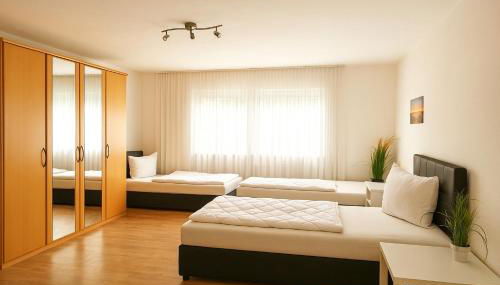 SUNNYHOME Monteurwohnungen und Apartments in Regensburg - Foto 2