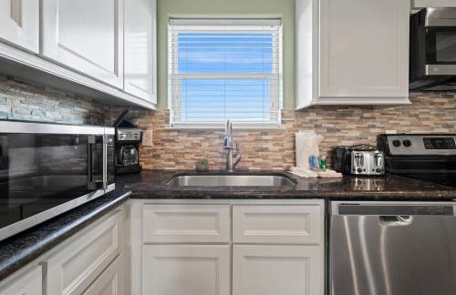 Charming Beachside Retreat: Steps from the Sand and Surf - Photo 11