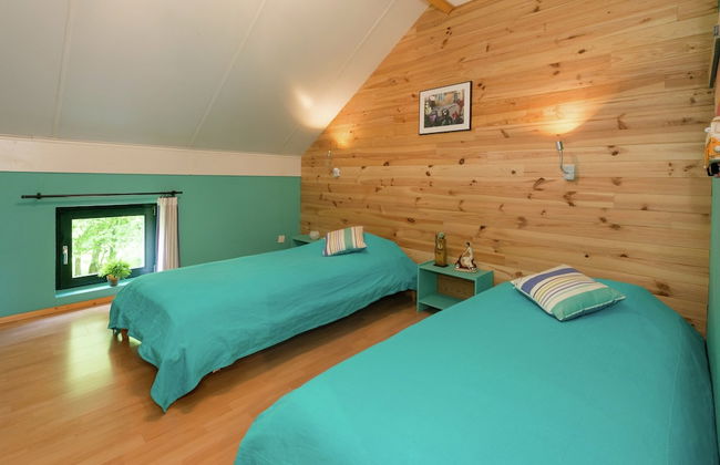 Rustic Holiday Home with Sauna & Hot Tub in Wooded Area - Photo 8