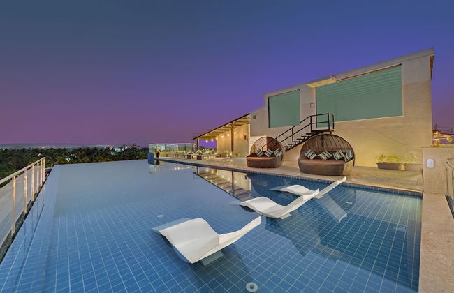 The Fern Habitat Candolim Goa - Foto 18