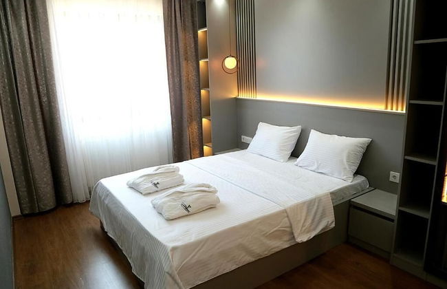 Flower City Suits - Photo 1