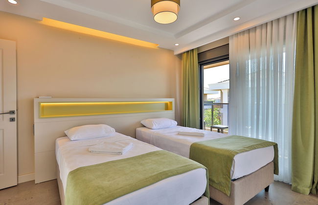 Nirvana Holiday Homes - Foto 10