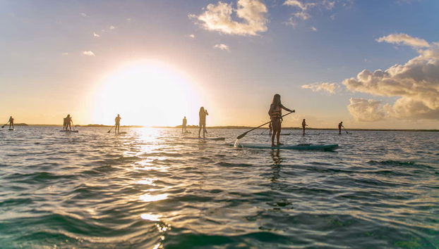 Paddle surfing in Bacalar Lagoon