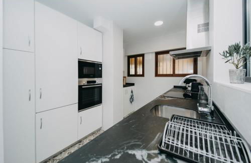 PISO EN LA PLAYA CON PISCINA - Photo 11