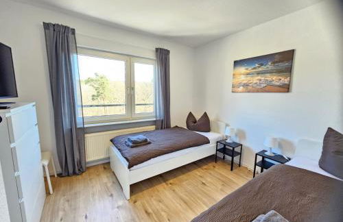 MR Living I modernes Apartment mit Einzelbetten, voll ausgestattete Küche, Balkon, WLAN, Parkplatz, ideal für Monteure I GI03 - Photo 4