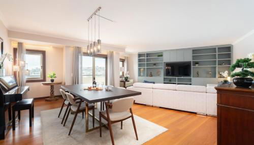 Elegant Riverfront Flat | Pool & Sports by Host Wise - Photo 2