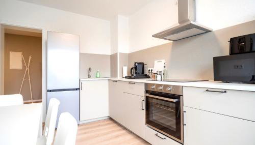 Juno - #1 Terrassen-Apartment, Netflix, WLAN - Foto 3, stove, dishwasher, toaster, minibar