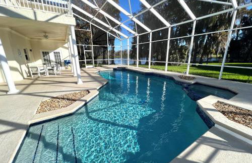 Lakefront Getaway LG South Facing Pool Hot Tub Pool Table & BBQ - 2 miles Disney - Foto 1