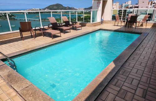 Praia do Canto Apart Hotel - Quarto sala e varanda - Foto 17