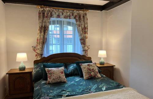 Apartament w XIX-wiecznym Spichlerzu nad Jeziorem z dostępem do parku i widokiem na Dworek Modrzewiowy z 1823 roku - Foto 6