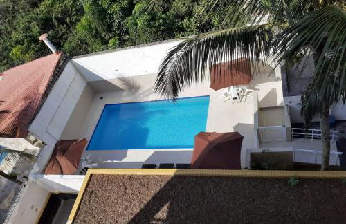 Apto no Jd Indaiá com piscina a 300m da praia - Foto 30