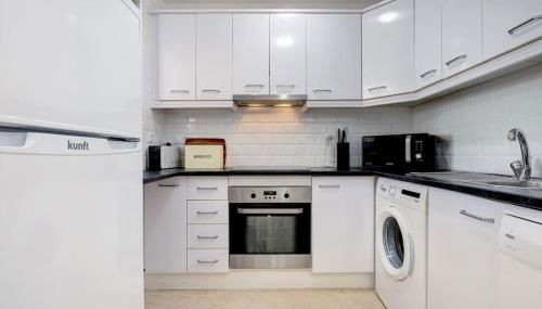 Stylish Penthouse Duplex at Matchroom Country Club - Photo 5