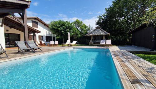 Villa 12 personnes proche oécan, 10 vélos et 4 surf fournis, entièrement climatisée - Foto 2, sunbed