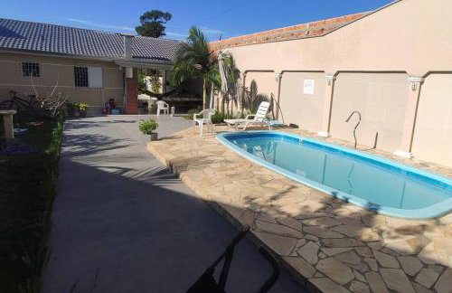 Casa com Piscina a 500m da Praia Ideal para Famílias em Guaratuba - Foto 6