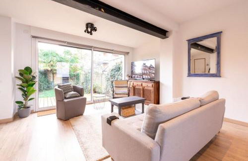 Maison avec garage et jardin - Photo 1