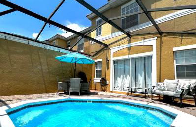 Stylish 3 bd townhouse near Disney with private pool. - Photo 1