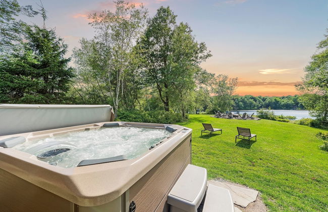 Waterside Haven by Avantstay Lakefront Hot Tub Game Room Fire Pit - Photo 1