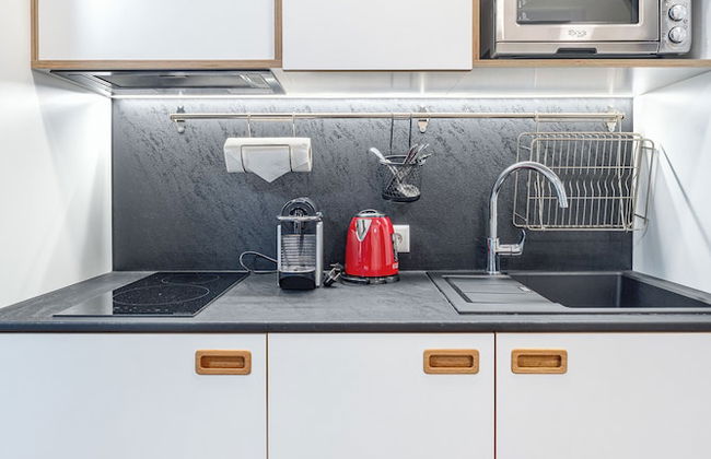 TopFloor Apartments - Photo 20