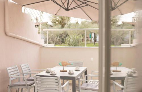 Palm Tree Apartments #FeelsLikeHome - Photo 1