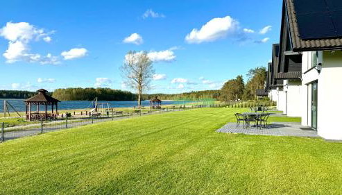 Domki nad jeziorem u Izy z balią ogrodową - Foto 4, Garden view