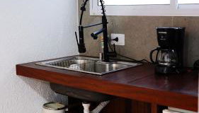 Flat Térreo com Piscina e Jardim Tropical - Foto 3, minibar