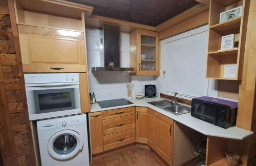 La casica de madera con Jacuzzi exterior y barbacoa - Foto 33