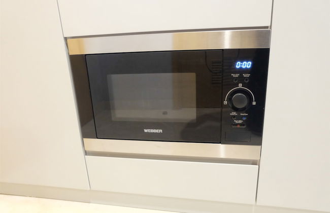 Homey Studio Room at Capitol Suites - Foto 11