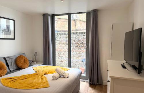 Central Brick Lane 2 Bedroom Flat - Private Patio - Foto 37