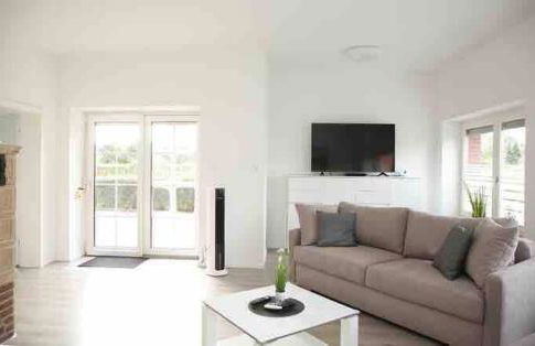 Wunderschöne und moderne Ferienwohnung mit Garten - Photo 1