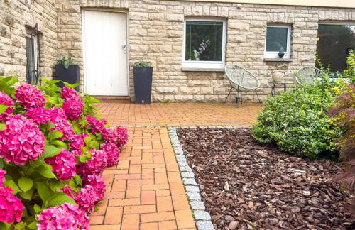 Souterrain Apartment mit eigenem Eingang und Terasse - Foto 4