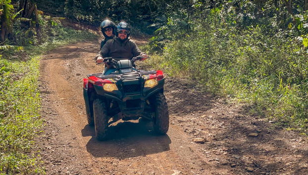 Quad biking down a dirt road