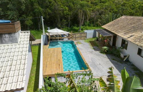 Casa Rústica com Piscina Privativa, Banheira de Hidromassagem, Ar-Condicionado, Pet friendly - Refúgio na Natureza a 5 Minutos do Centro de Imbituba, Perfeita para Famílias e Grupos - Photo 11