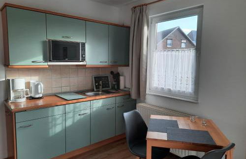 Ferienhaus Sasse Ferienwohnungen mit Garten & Grill - Foto 15