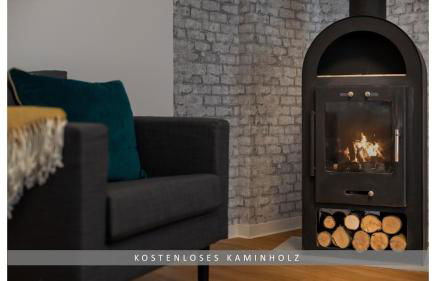 Apartment Leinetal mit Kamin & Kaminholz, 1-3 Personen , Schlafzimmer mit Boxspringbett 180x200 & hochwertige Hotelbettwäsche, bequemes Einzelbett im Wohnzimmer, Terrasse, Einbauküche, - Photo 3