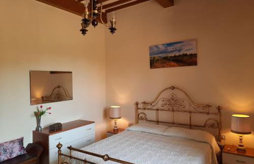 INCANTEVOLE CASA TOSCANA con travi in legno, ampia terrazza e vista sulle colline - Foto 35