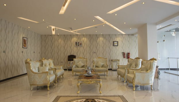 Home Station Hotel - Photo 4, Coin salon dans le hall