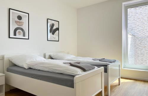 Moderne Apartments im Herzen der Stadt I private Tiefgarage mit Ladesäulen I home2share - Foto 35