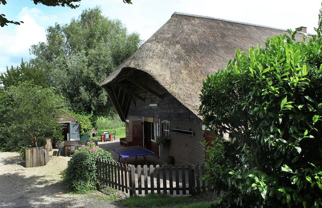 Quaint Farmhouse near River in Oosterwijk - Foto 1