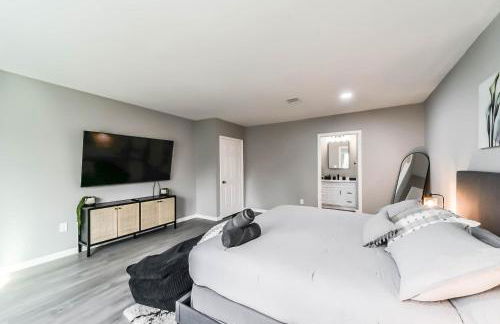 Comfy 5BR Holiday Home with Hot Tub, 10min from NGR Stadium - Foto 5