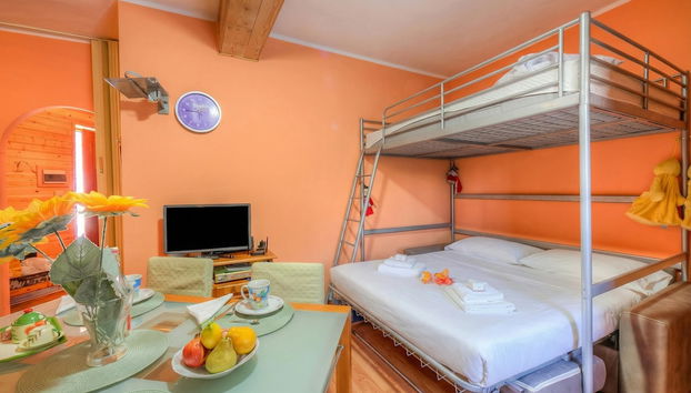 Borgata Family Studio Ski In Ski Out 300m - Happy Rentals - Foto 5, Habitación