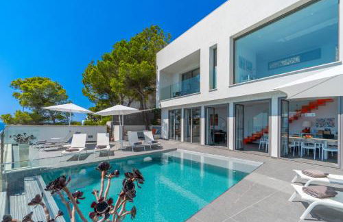 Can Ema, villa moderna con piscina frente al mar - Photo 46