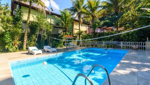 Casa com piscina aquecida a 100m da praia Maresias - Foto 4