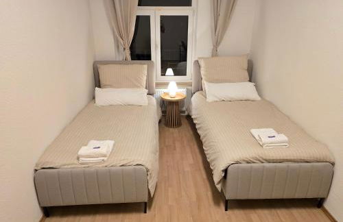 Boardinghouse mit 10 großen Apartments mit Parkplatz und Balkon - Photo 46