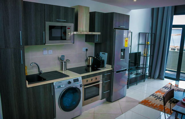 Embassy Gardens Premier Suites - Photo 26