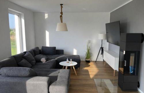 HausLIEBLINGSPLATZ - am Meer - Luxus Villa mit 4 Schlafzimmern, 3 Badezimmern Sauna, Kamin, Weber-Grill und Wallbox - Foto 9